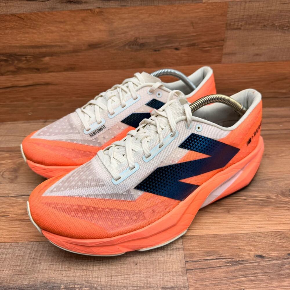 New Balance mens size 11.5 FC Rebel V4 Orange Running Sneakers